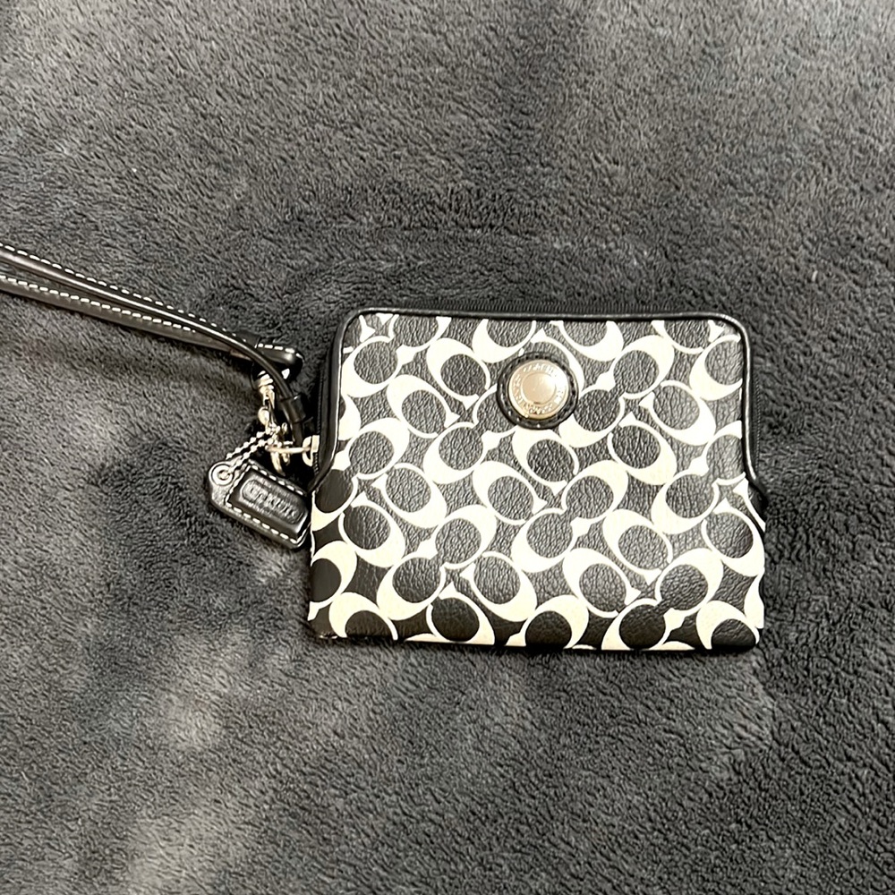 Cute black and white Coach wristlet. EUC